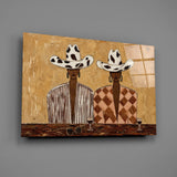Cowgirl Duo Cow-Print Hats Warm Tones Glass Wall Art