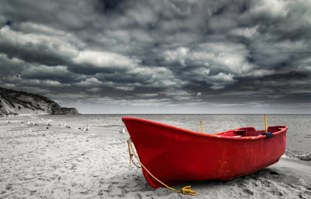 Red Kayak Glass Wall Art