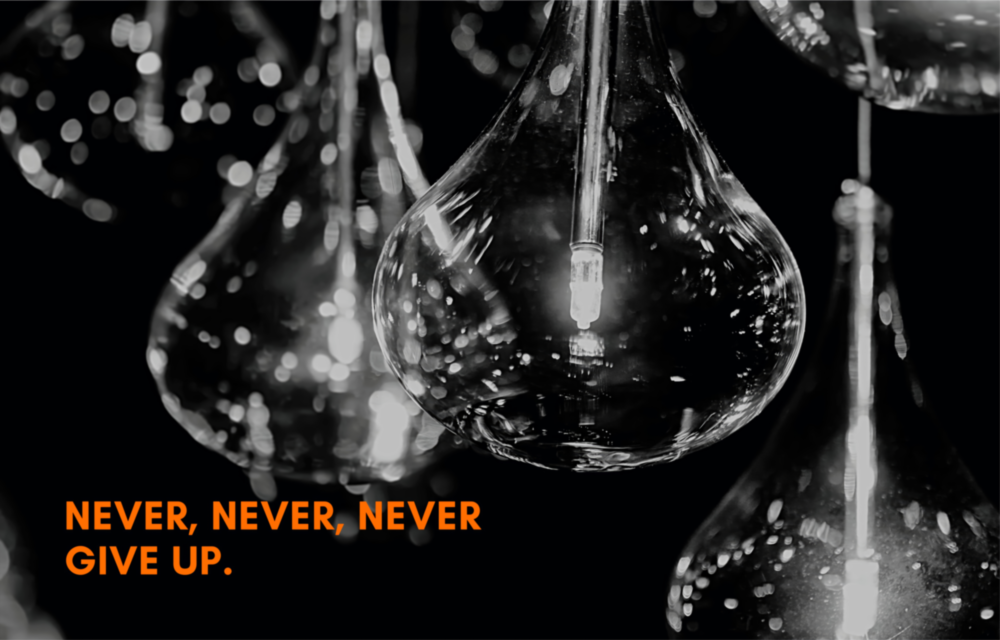 Never Give Up Glass Wall Art